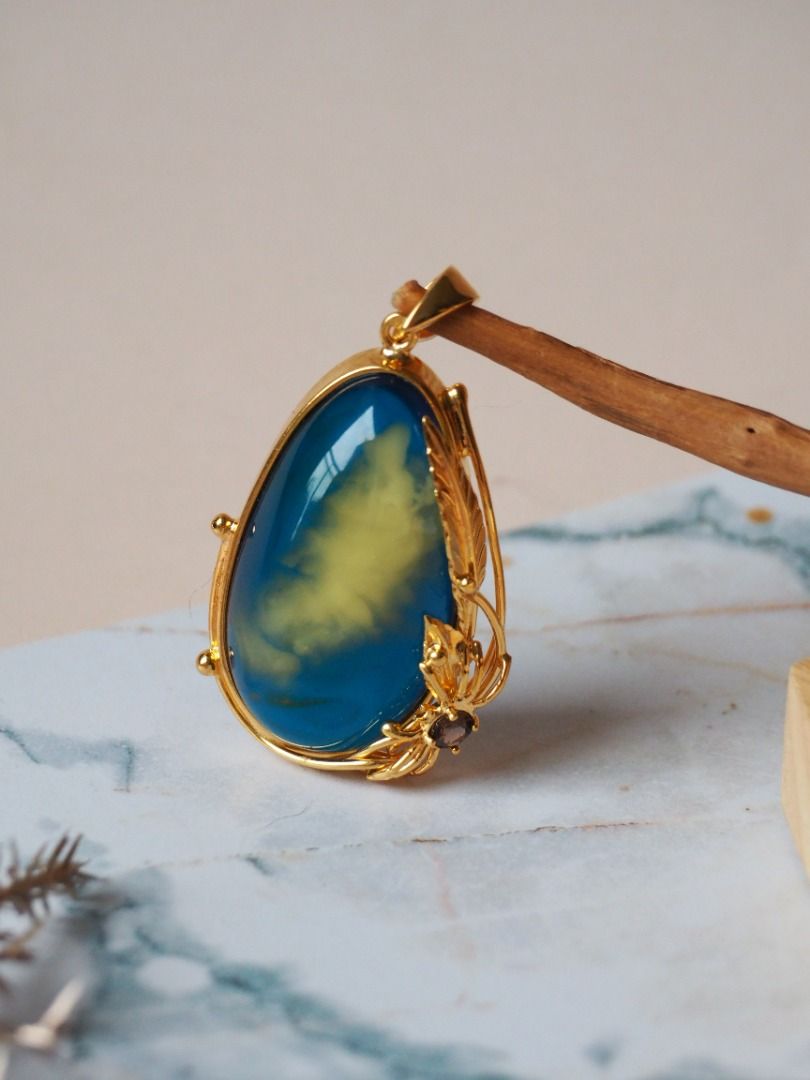 Blue amber discount pendant