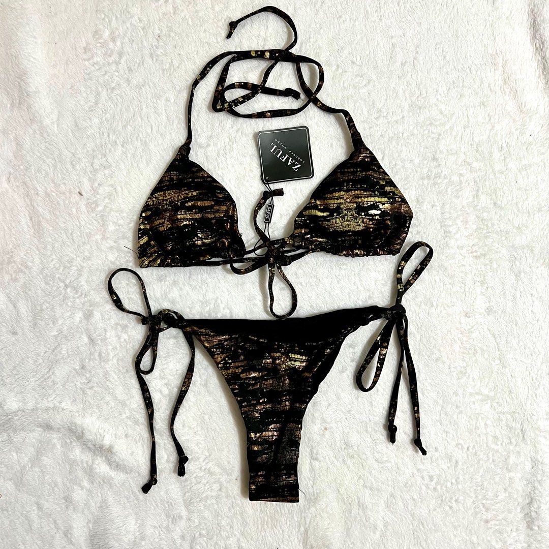 Zaful Black Gold Triangle Two Piece Bikini / Swimsuit (Category: Bikinis & Swimsuits) located in Dasmarinas. Submitted by fancy_styleph (Listing ID 1259553368, Image 1). Description: Size: Medium ❗️BUY 3 for 500PHP❗️ ❗️BUY 4 for 600PHP❗️.