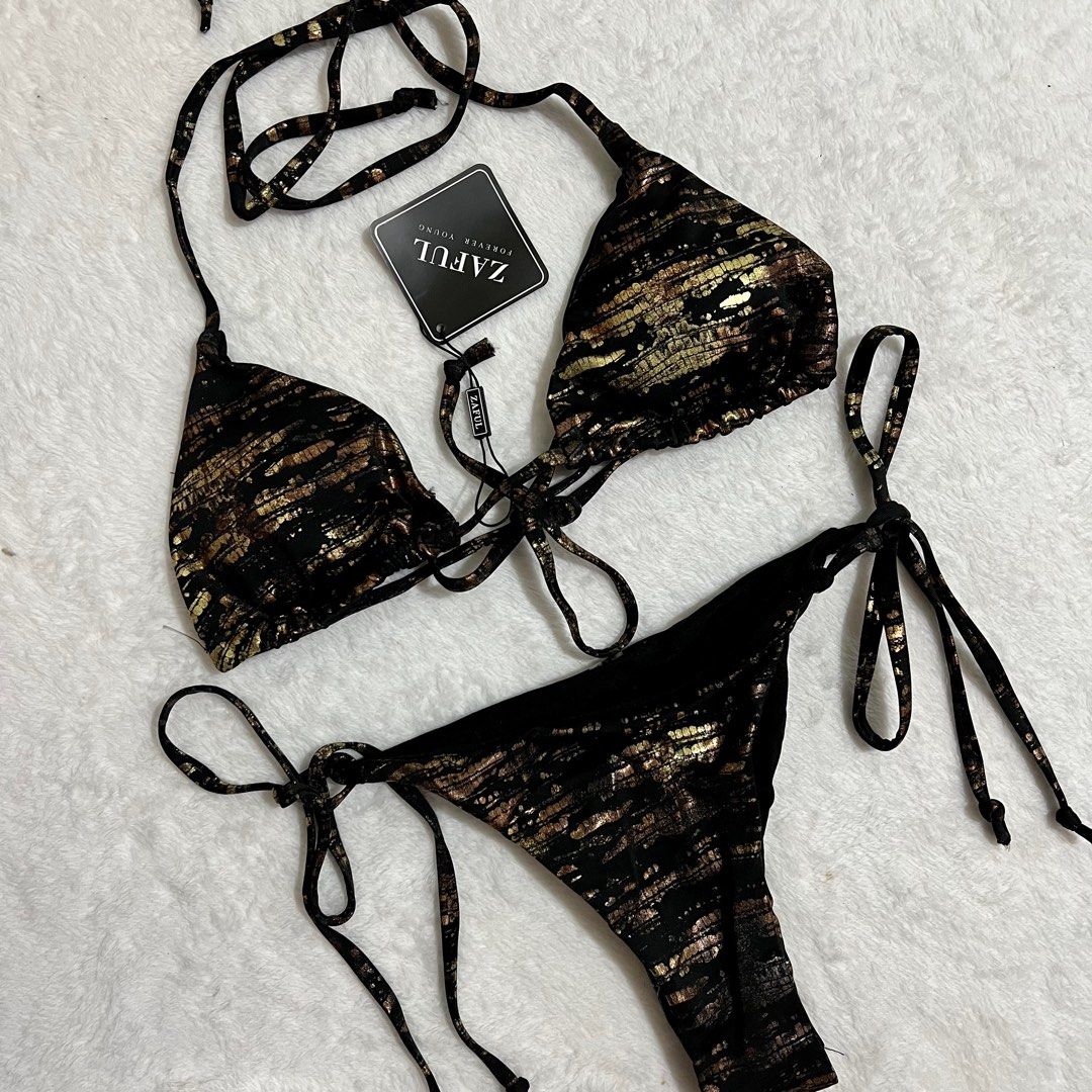 Zaful Black Gold Triangle Two Piece Bikini / Swimsuit (Category: Bikinis & Swimsuits) located in Dasmarinas. Submitted by fancy_styleph (Listing ID 1259553368, Image 2). Description: Size: Medium ❗️BUY 3 for 500PHP❗️ ❗️BUY 4 for 600PHP❗️.