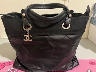 Chanel handbag raincoat, 名牌, 服裝- Carousell