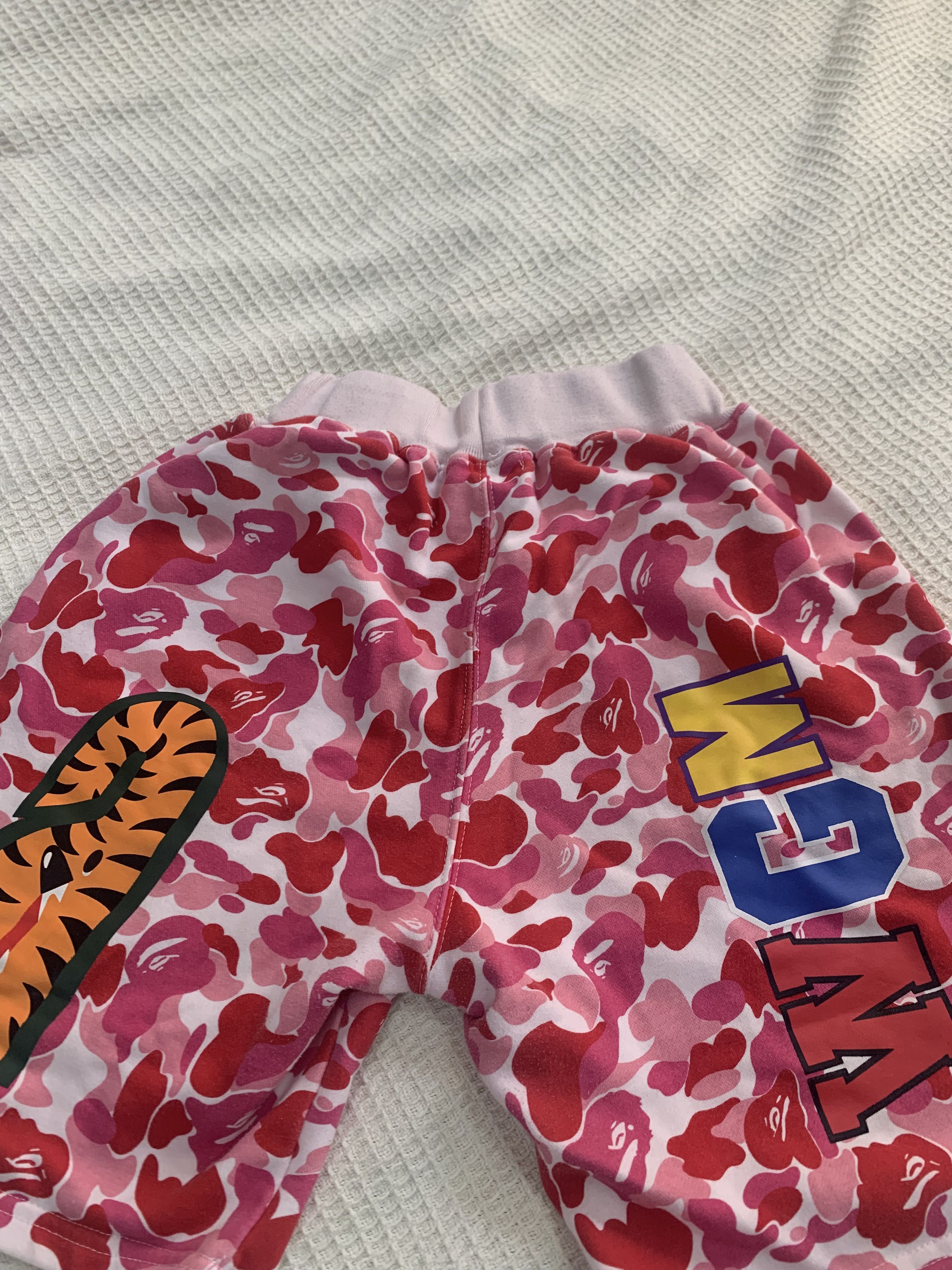 Pink bape shorts store