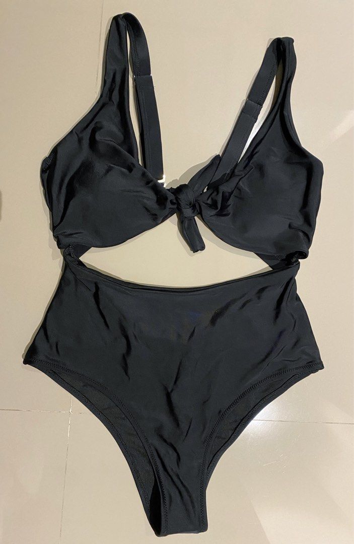Shein Black Cutout Knot Swimsuit S (Category: Bikinis & Swimsuits) located in Pasig City. Submitted by fashionforward16 (Listing ID 1259731902, Image 3). Description: New with Hygienic Liner. Size Small, further size details in the photo slide. Models pics from website reviews (are not mine)..