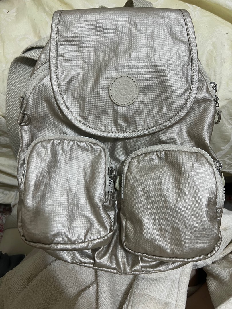 Kipling firefly 2025 up metallic