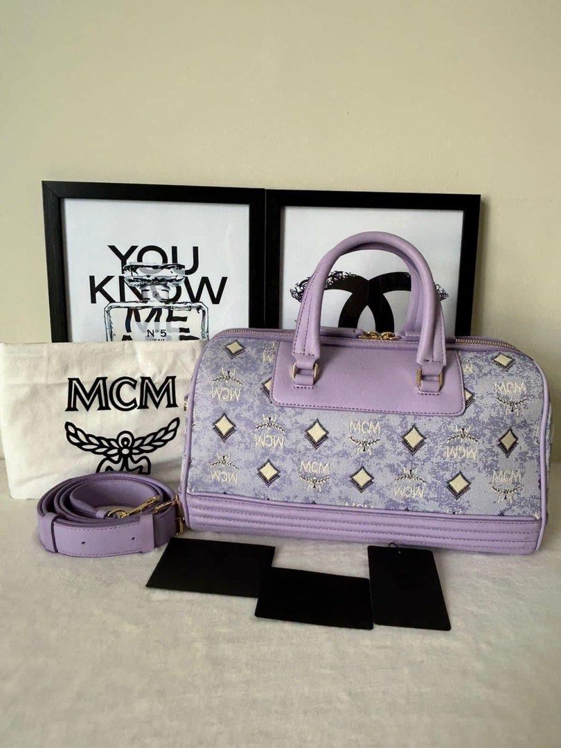 MCM Medium Boston Bag (Category: Luxury Bags & Wallets) located in Manila. Submitted by bagislifeshop (Listing ID 1259664201, Image 1). Description: ☑️Available in Pampanga ✅Condition: 9/10 ✅Material: Visetos canvas and nappa leather ✅Colour: Lavender in GHW ✅Size: 30 X 20 CM ✅Inclusions: Dustbag, long strap, card and tag .