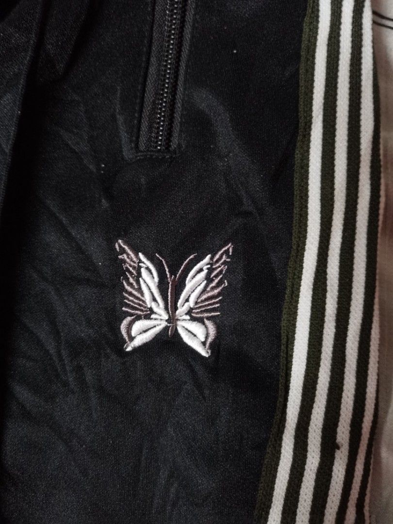 Needles track pants (Category: Joggers) located in Apalit. Submitted by _doer (Listing ID 1259728193, Image 2). Description: Size 28 to 30 LENGTH 35.5 No flaws.