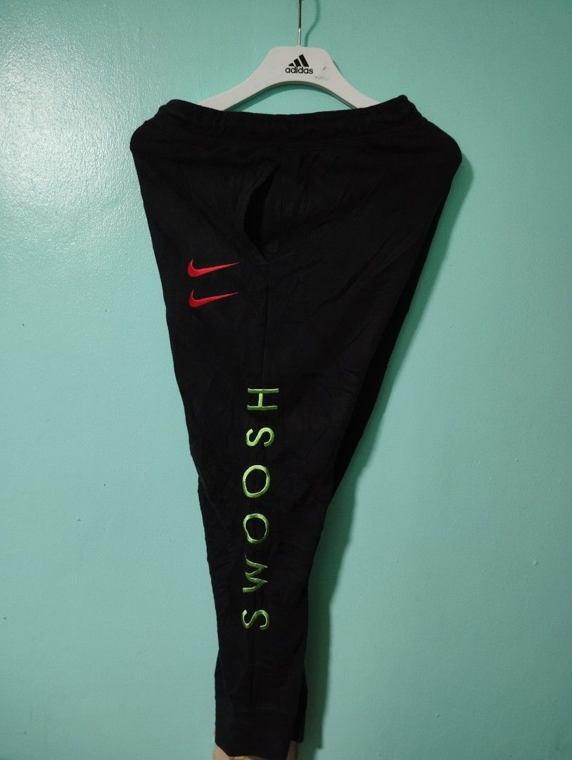 nike swoosh joggers black and white
