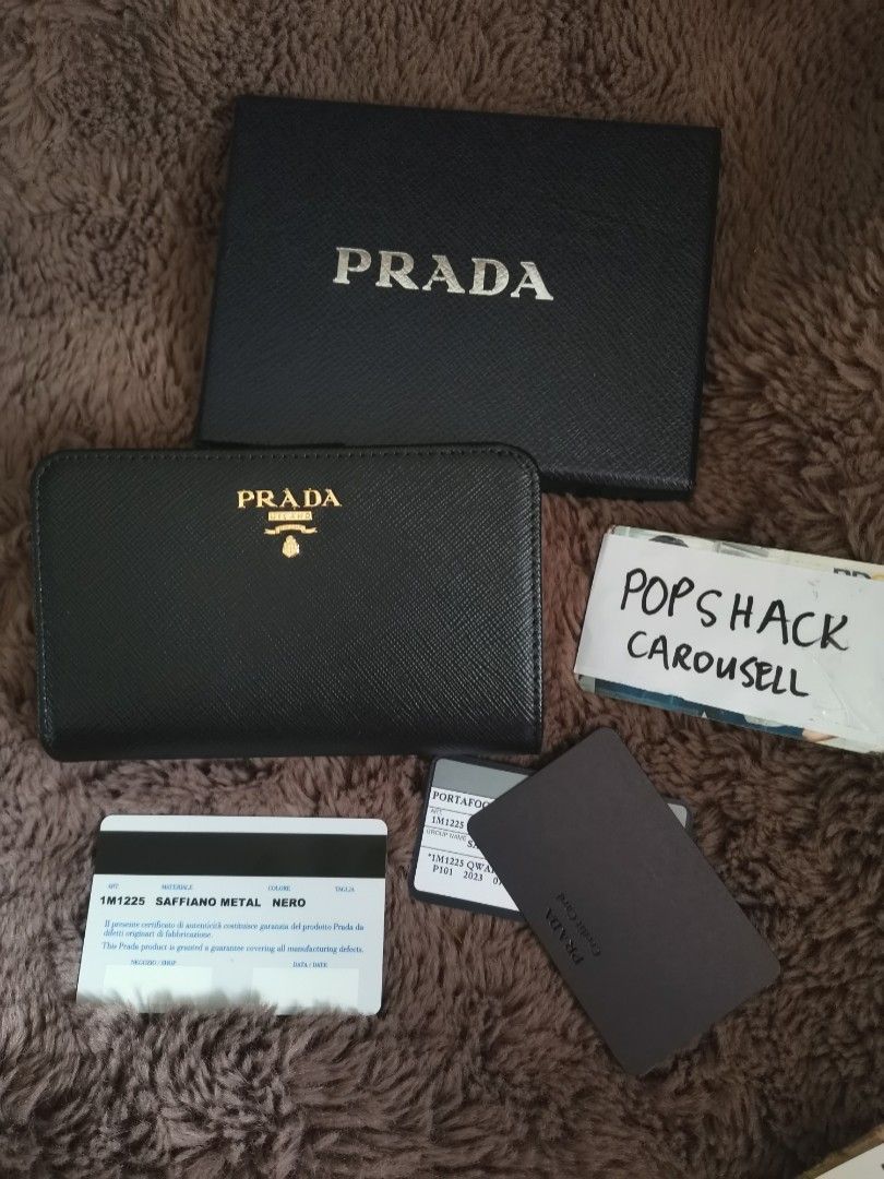Authentic Prada Saffiano WOC in Bluette, Luxury, Bags & Wallets on Carousell