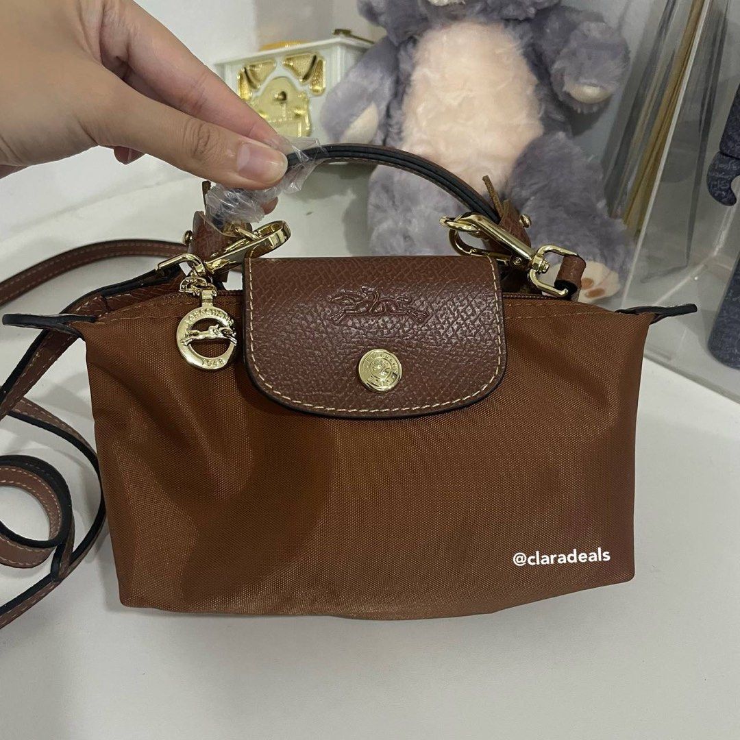 Longchamp Le Pliage Pouch with Handle in Cognac, Luxury, Bags & Wallets on  Carousell