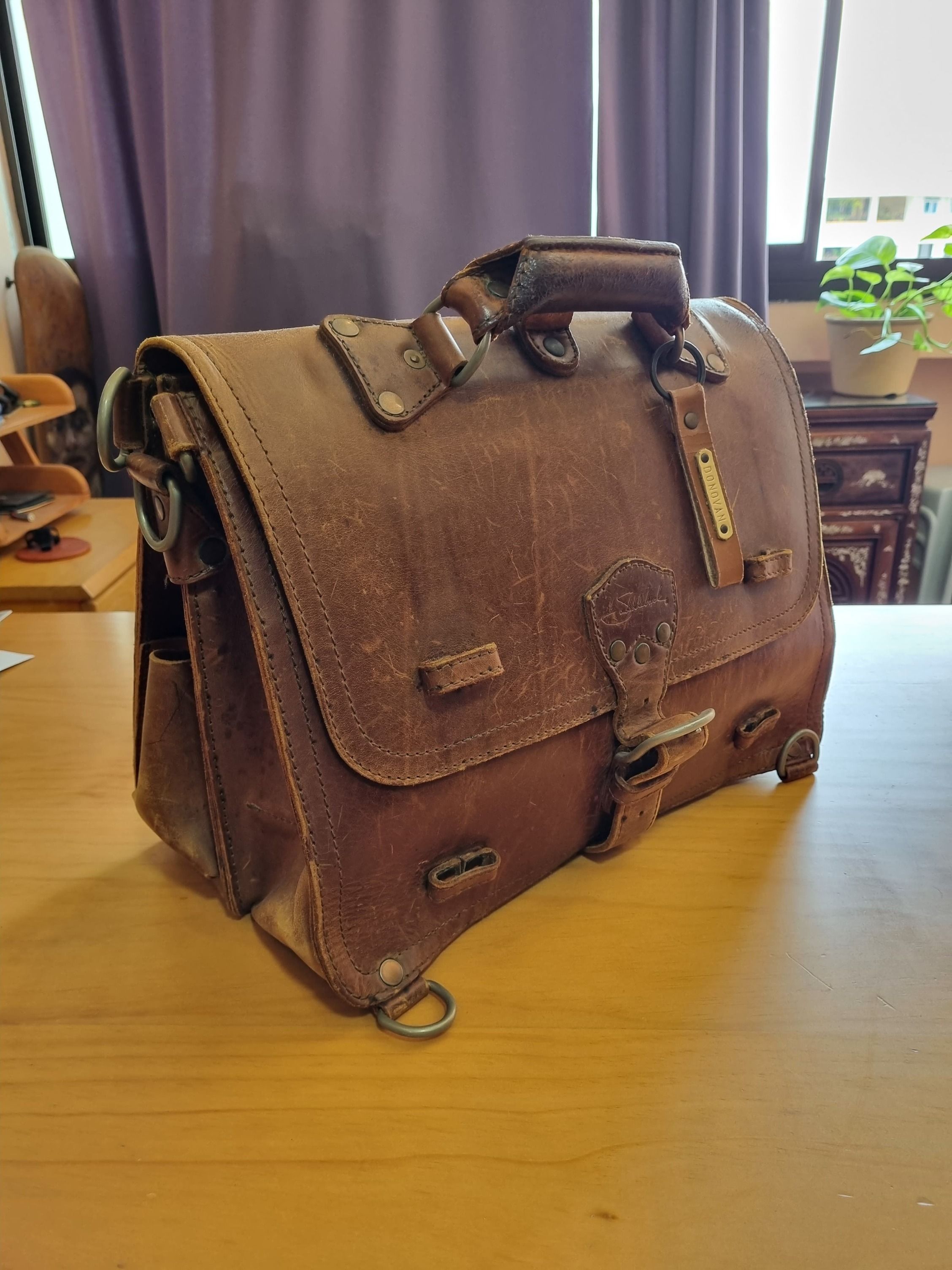 Saddleback Leather Large Classic Briefcase Tobacco 100 year warranty by manufacturer. Yes 100 years