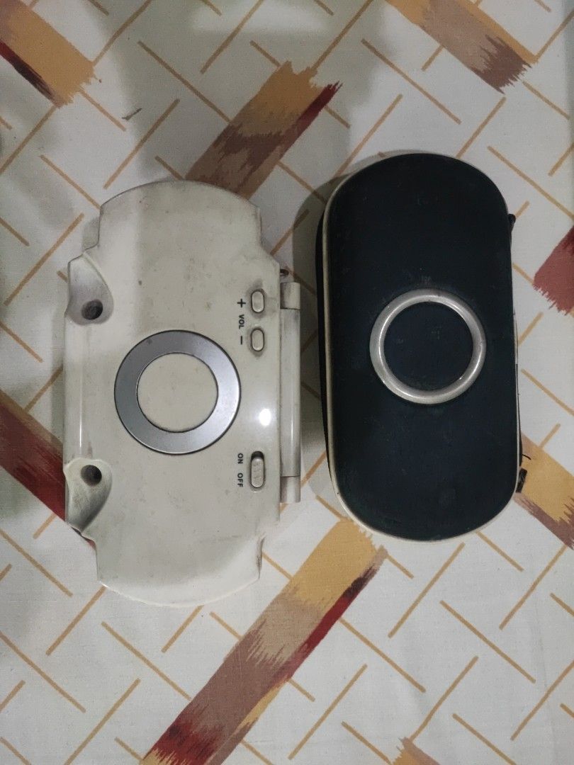 Selling psp 2000 (Category: PlayStation) located in Quezon City. Submitted by wilhelm1990 (Listing ID 1259666950, Image 2). Description: Selling my psp 2000 still works plugged in. with case and memory cards with games already. Jailbreak. with original charger. you can play it or use it for spare parts no parts was replaced on this unit. No battery. It is sold as a set. Will add another old console in my collection if found add appropriate price 