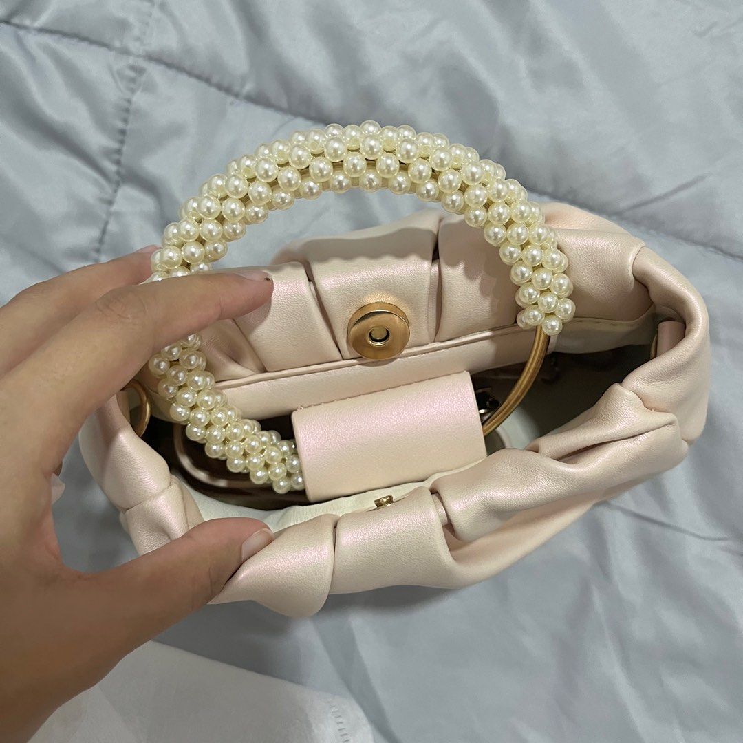 Pink pearl clutch bag hotsell
