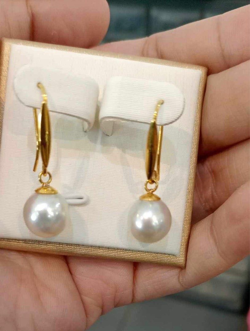 Gold and hot sale pearl dangle earrings