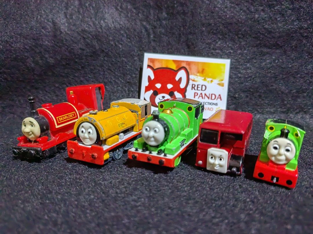 Thomas and Friends Diecast Set (Category: Vehicle & Diecast Models) located in Davao. Submitted by redpandacollections (Listing ID 1259711097, Image 1). Description: Thomas and Friends Diecast Set Authentic From Japan in Good Condition and Quality as is in the picture provided Consist of 5pcs Branded Bandai and Tomica Tomy 3 Diecast and 2 PVC types. Items already on sale prices Can be sold separately for 150 each Smallest or mini is 50.