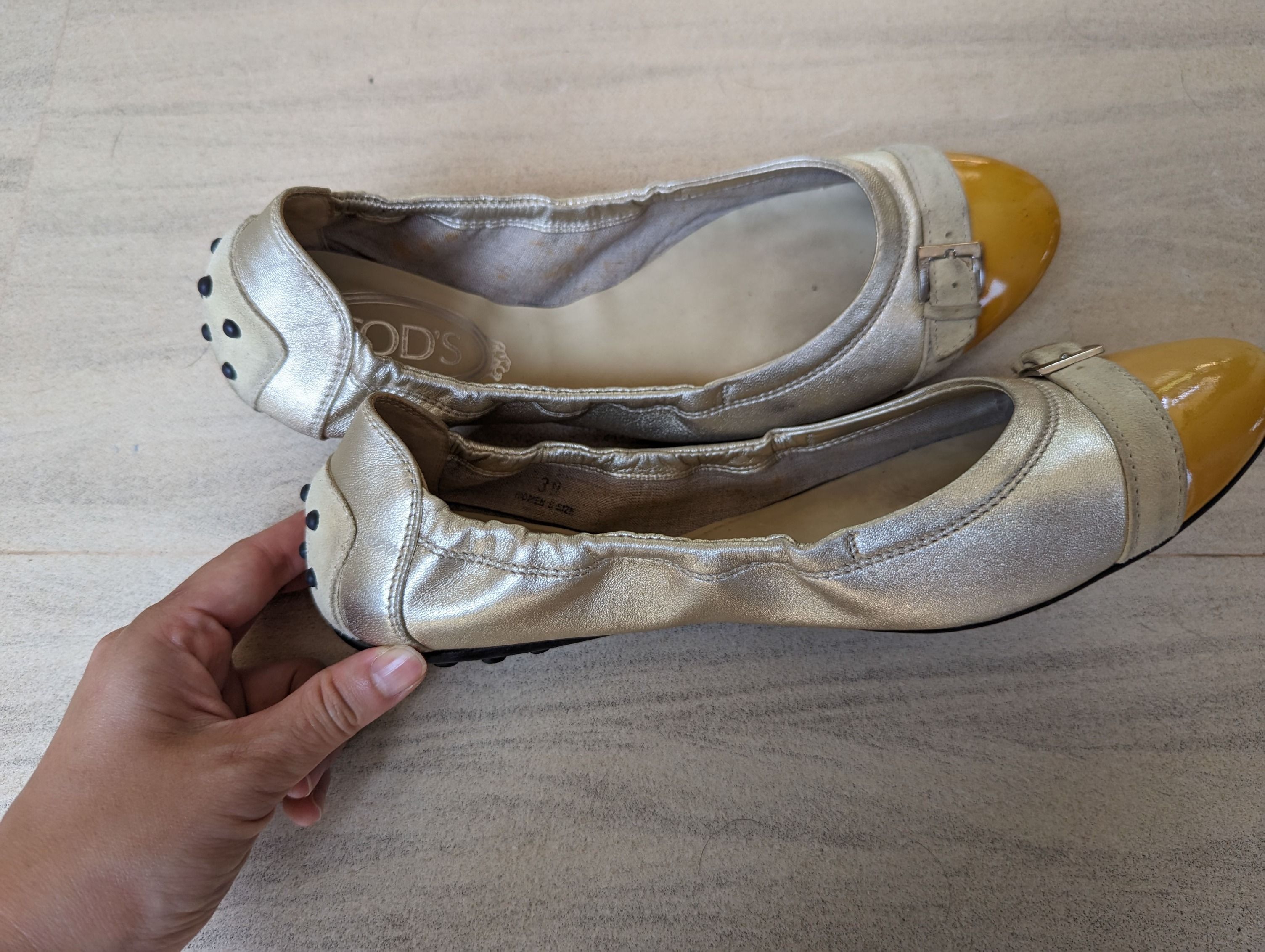 Tod s Leather Ballet Flats in gold and yellow Luxury Sneakers