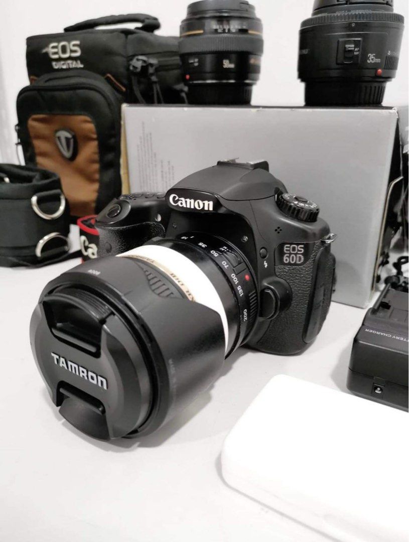 CANON 60D (Category: Cameras) located in Pasay City. Submitted by cleojoy (Listing ID 1259863107, Image 1). Description: FOR SALE: CANON 60D (SELLING AS BUNDLE) ORIGINAL PRICE: P33,500 LAST PRICE: P26,500 📌Inclusions: - Canon 60D Body (Unknown Shuttercount) - 1 Battery & Charger - Youngnuo 35mm f/2.0 - Canon 50mm f/1.4 USM - Tamron 18-200mm with Lens Hood - Rosca Tripod TT - 200 - Camera Waist Belt - Silicon Camera Body (hindi naisama pic) 📌Fre
