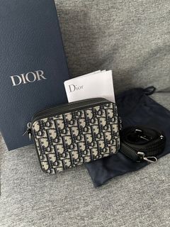 Shop Christian Dior Pouch with shoulder strap (2ESBC119CDI_H00N,  2OBBC119YSE_H03E, 2OBBC119YSE_H05E, 2ESBC119CDI_H00N, 2OBBC119YSE_H03E,  2OBBC119YSE_H05E) by mariposaz