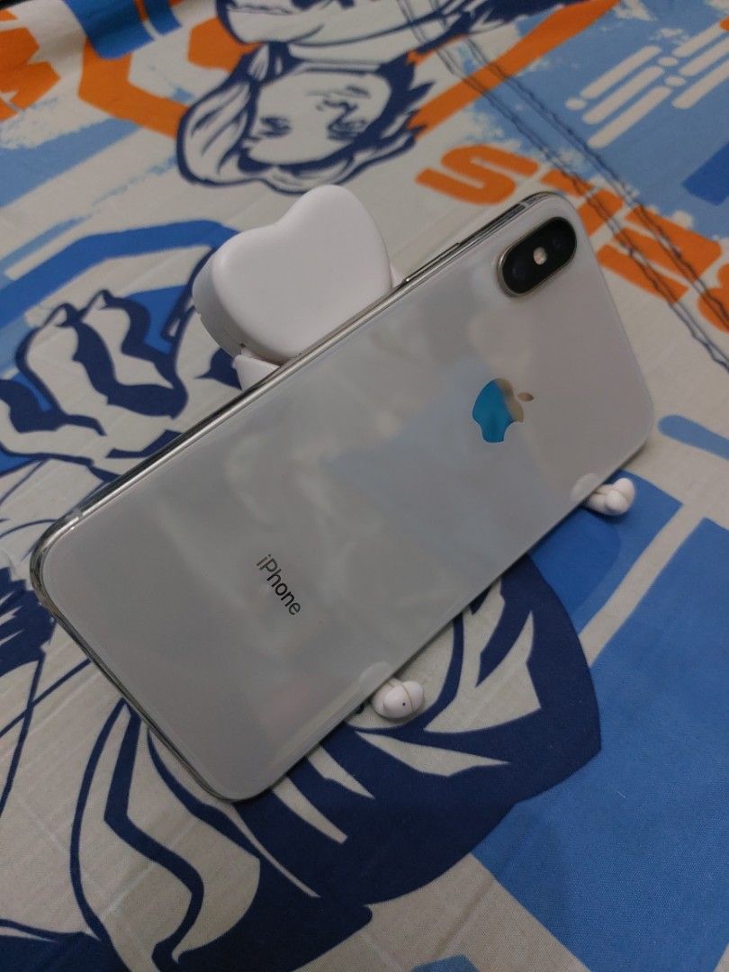 IPhone X White 64GB(Sun Locked) (Category: iPhone X Series) located in Baguio. Submitted by master_of_brands (Listing ID 1259796971, Image 1). Description: IPhone X White 64GB (Sun Locked) ✅️ for SUN sim user only ✅️unli reset ✅️no history of repair ✅️64 GB White Silver ✅️72% Battery Health(Still original) No icloud issue ✅️True tone working ✅️Face unlock working 👉 Hair line cracked( below left corner doesn't affect the performance) ✅️ Free new 