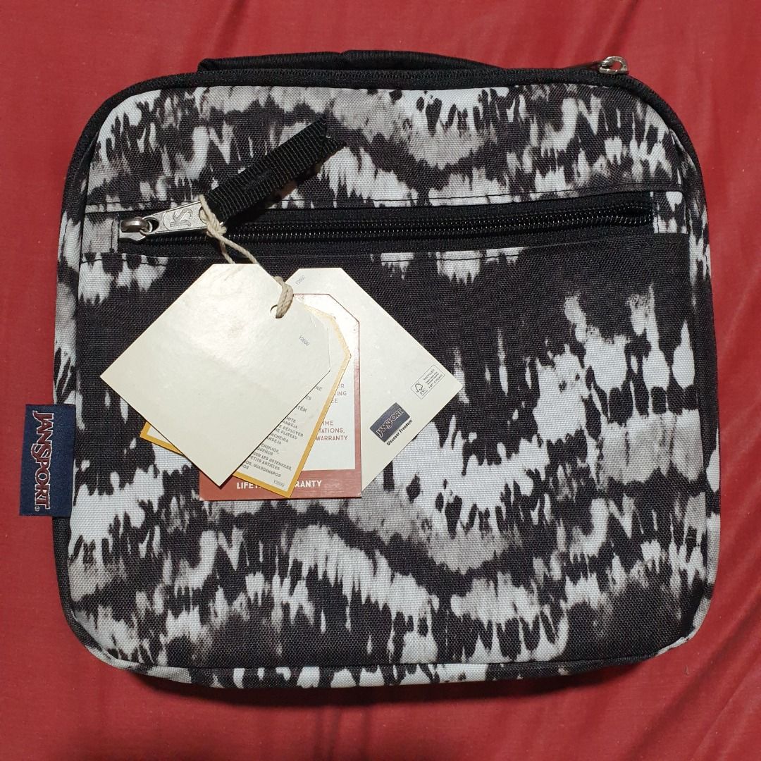 Jansport Lunch Bag (Category: Food Organization & Storage) located in Baguio. Submitted by formorecravings (Listing ID 1259873567, Image 2). Description: Insulated main compartment External zippered pocket for utensils and other small items Angled opening Padded handle Dimensions: 22cm x 23.5cm x 7.75cm *Last 3 pictures are for reference only.