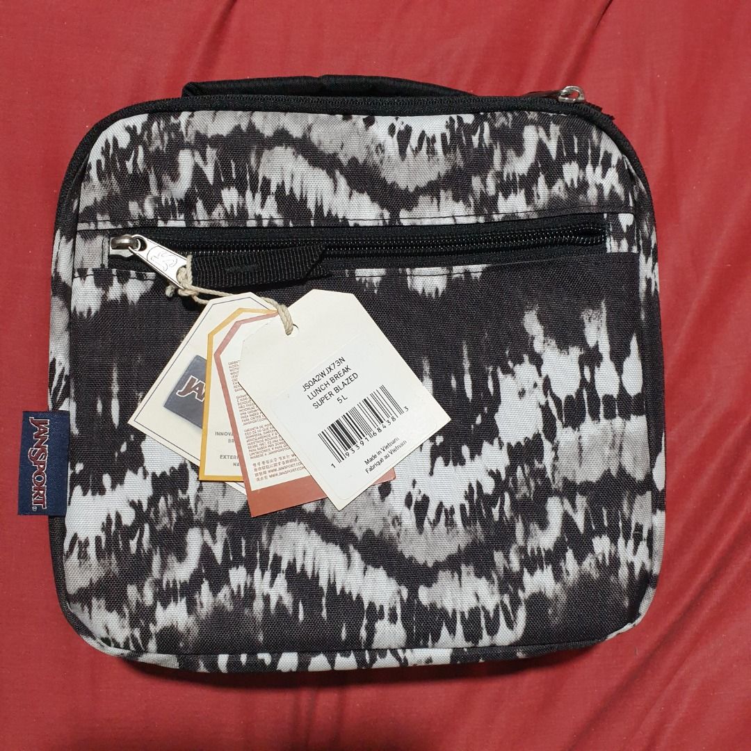 Jansport Lunch Bag (Category: Food Organization & Storage) located in Baguio. Submitted by formorecravings (Listing ID 1259873567, Image 3). Description: Insulated main compartment External zippered pocket for utensils and other small items Angled opening Padded handle Dimensions: 22cm x 23.5cm x 7.75cm *Last 3 pictures are for reference only.