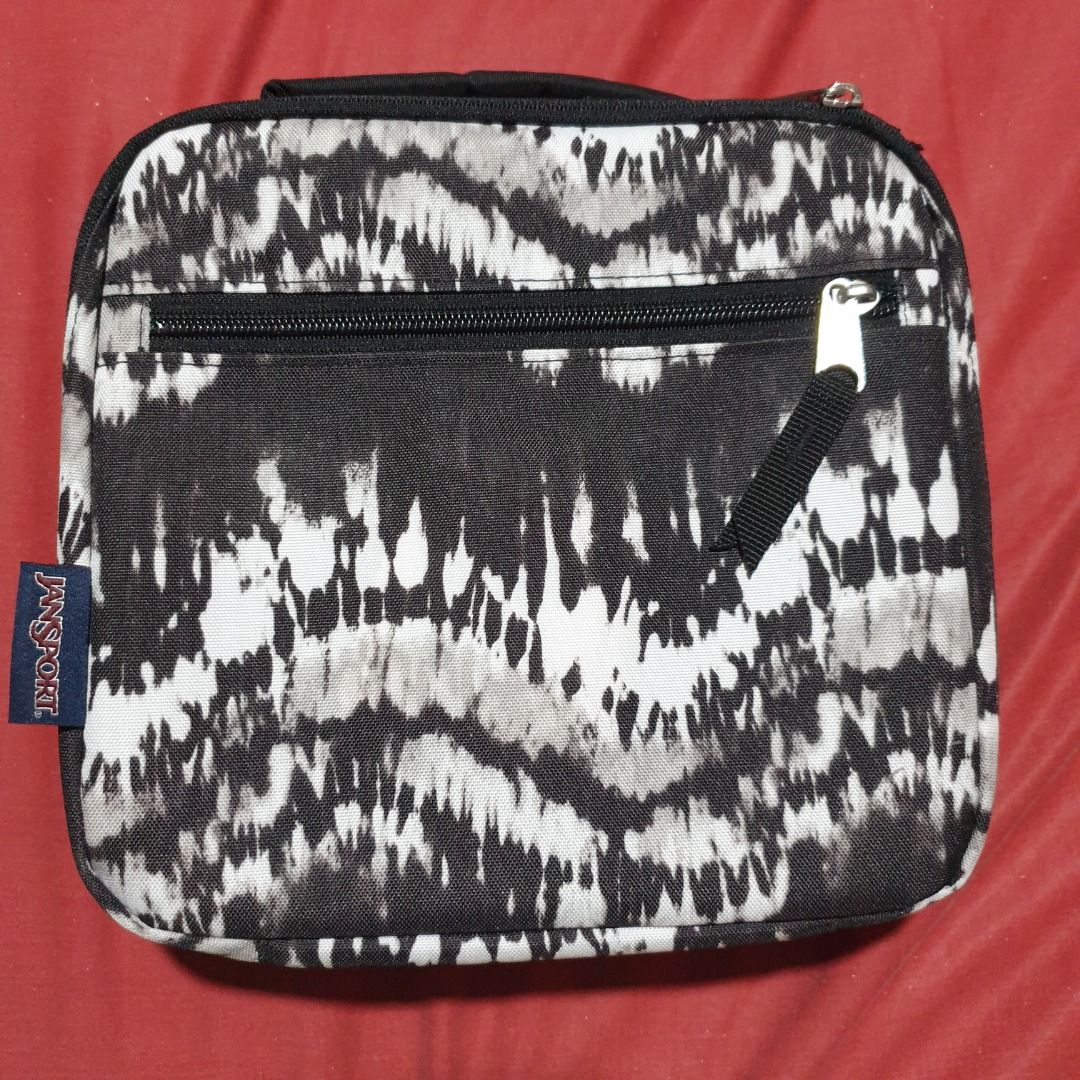 Jansport Lunch Bag (Category: Food Organization & Storage) located in Baguio. Submitted by formorecravings (Listing ID 1259873567, Image 1). Description: Insulated main compartment External zippered pocket for utensils and other small items Angled opening Padded handle Dimensions: 22cm x 23.5cm x 7.75cm *Last 3 pictures are for reference only.