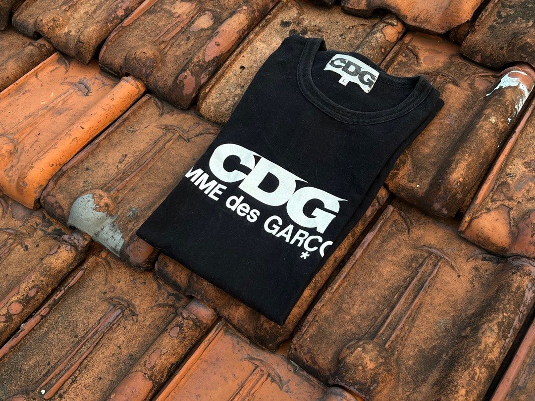 Comme des top garcons uniqlo precio