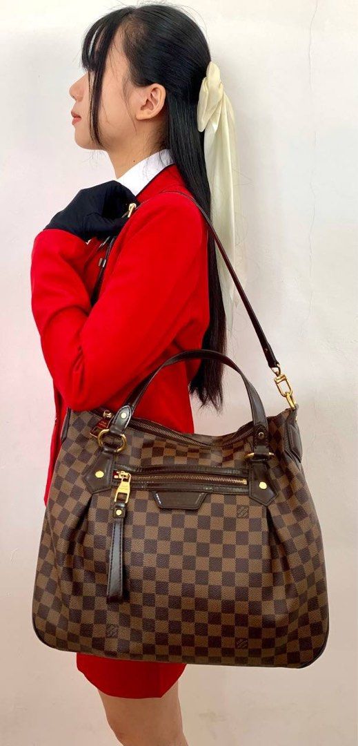 Evora leather handbag Louis Vuitton White in Leather - 35514580