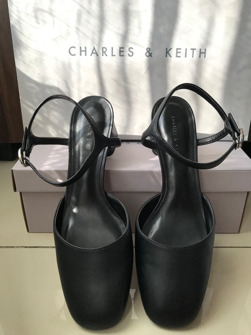 pumps with strap across the foot