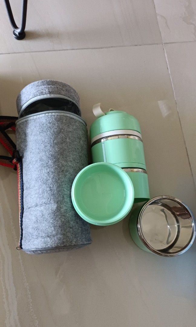 Stackable Lunch Box (Category: Other Kitchenware & Tableware) located in Singapore. Submitted by newbk (Listing ID 1259836336, Image 2). Description: Height 30cm Diameter 13 cm.