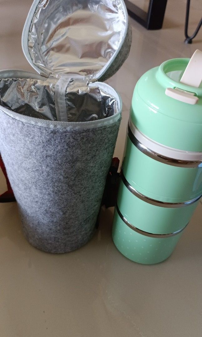 Stackable Lunch Box (Category: Other Kitchenware & Tableware) located in Singapore. Submitted by newbk (Listing ID 1259836336, Image 1). Description: Height 30cm Diameter 13 cm.