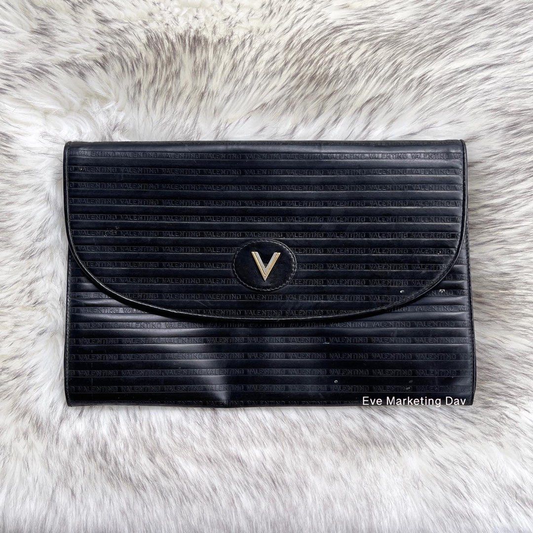 Mario valentino clutch bag, Luxury, Bags & Wallets on Carousell