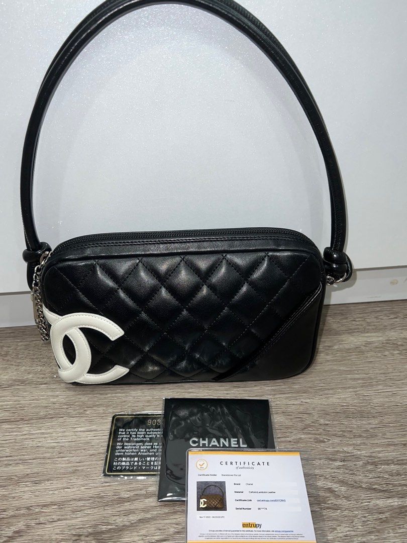 Authentic Chanel Vintage Cambon Pochette in Black Lambskin SHW