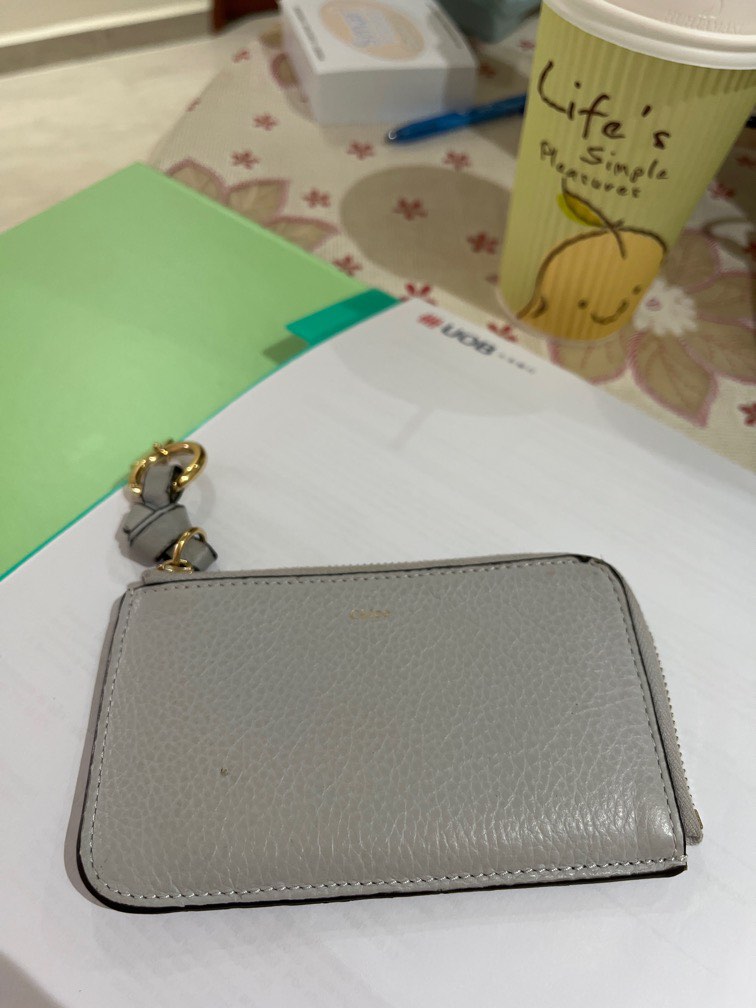 Authentic Chloe wallets come with warranty card