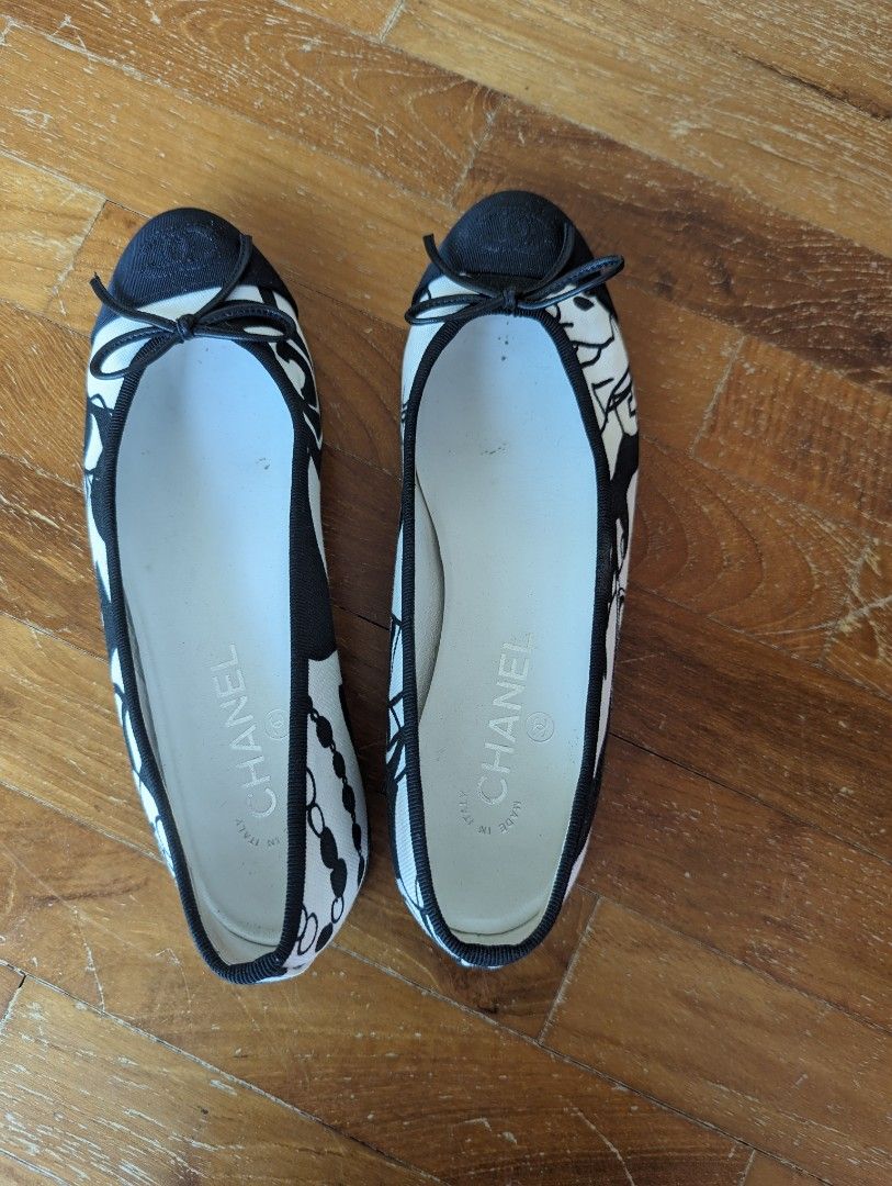 Chanel black 2025 and white flats