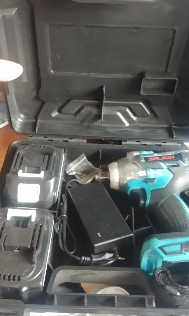 Cordless Impact Wrench w 2 batteries (Category: Maintenance Fluids and Filters) located in Quezon City. Submitted by fh7176 (Listing ID 1259980560, Image 3). Description: cordless impact wrench. 1/2 drive. w 2 batteries and charger. with straps and plastic case. Tried only for testing. text me. 0945-432-4890.