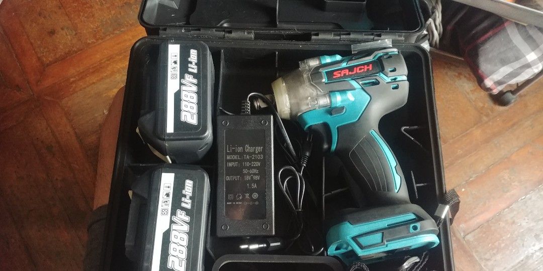Cordless Impact Wrench w 2 batteries (Category: Maintenance Fluids and Filters) located in Quezon City. Submitted by fh7176 (Listing ID 1259980560, Image 2). Description: cordless impact wrench. 1/2 drive. w 2 batteries and charger. with straps and plastic case. Tried only for testing. text me. 0945-432-4890.