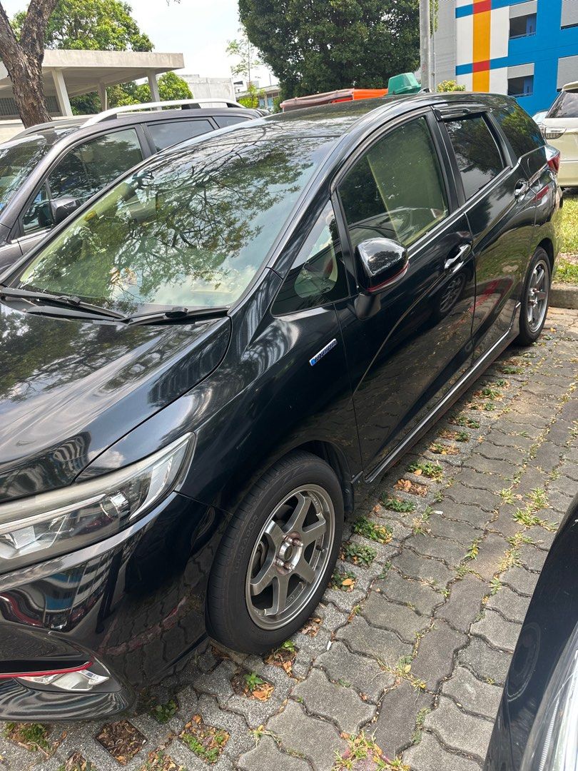 Honda Shuttle Hybrid Honda shutter hybrid Auto (Category: Used Cars) located in Singapore. Submitted by jimmylimo4833 (Listing ID 1260006758, Image 3). Description: Direct owner seller Hifi, leather seat, front/back rear camera , retractable mirror, sport rims and lots of internal accessories. Front fog light. Svcs every 10 k. N suspension rod balance. 1 owner . New Ac compressor n condenser . .