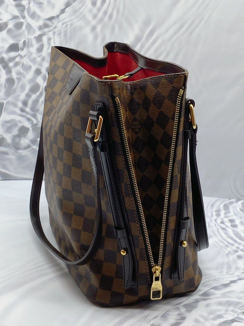 Louis vuitton bag best sale with zippers on side