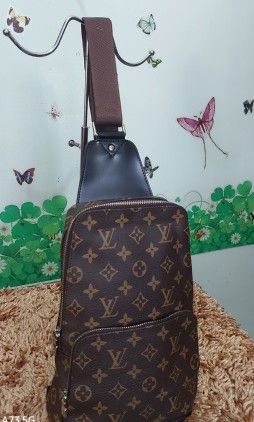 LV sling chest bag, Luxury, Bags & Wallets on Carousell