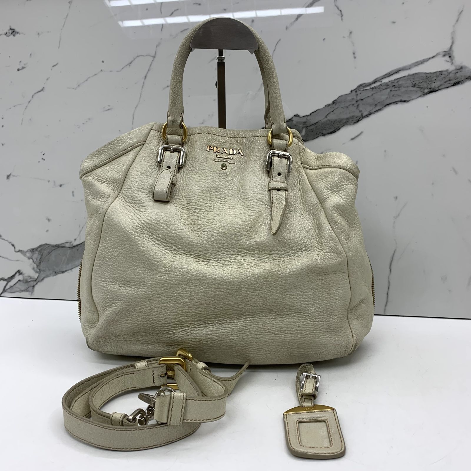 White prada purse top