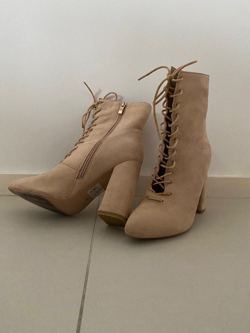 Ankle boots with open store front