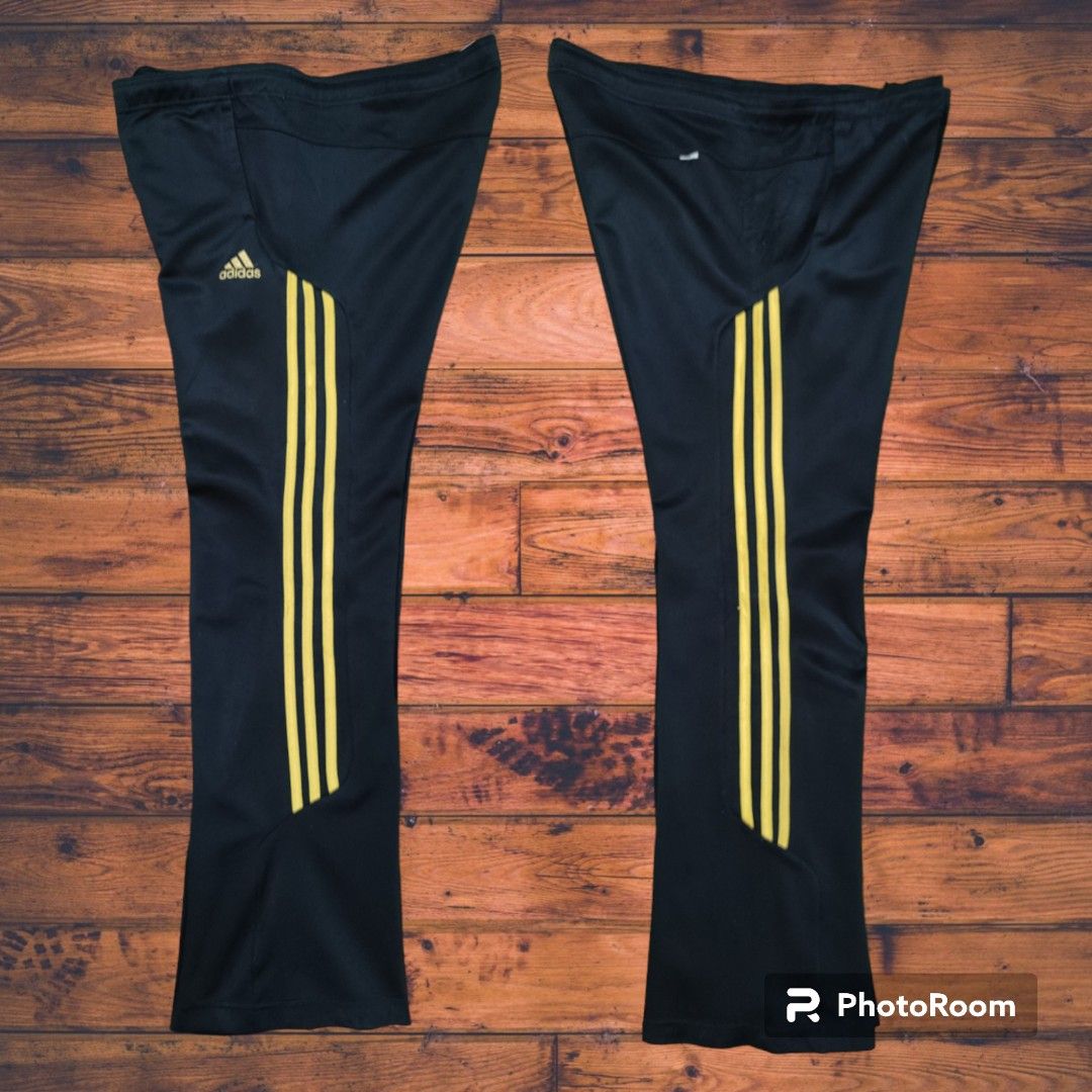 Adidas pants with shop gold stripes
