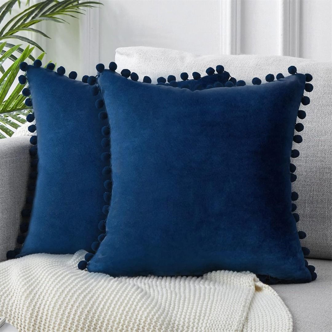 Navy pom pom cushion new arrivals