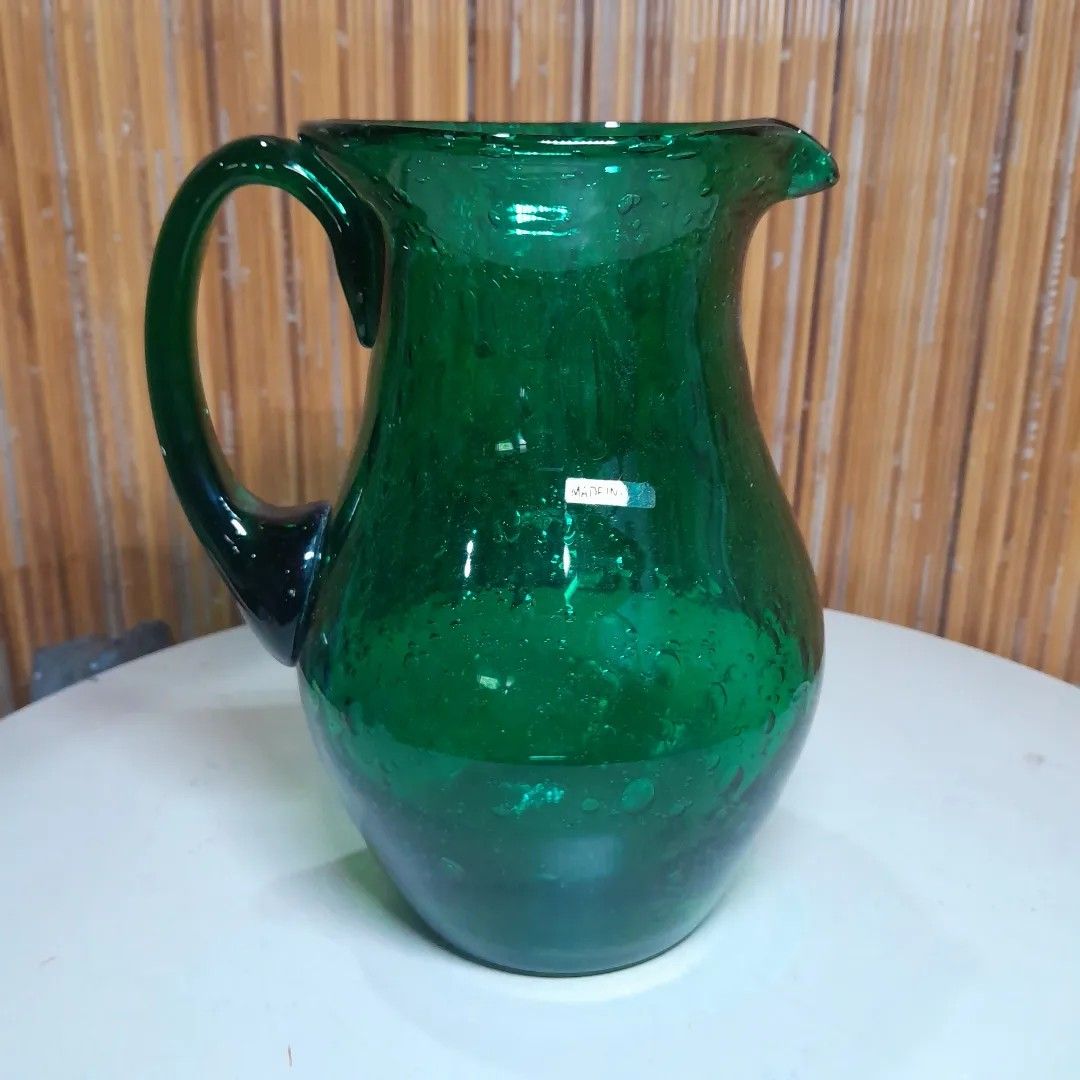https://media.karousell.com/media/photos/products/2023/10/14/vintage_green_glass_pitcher_1697295093_5f47f60d_progressive.jpg
