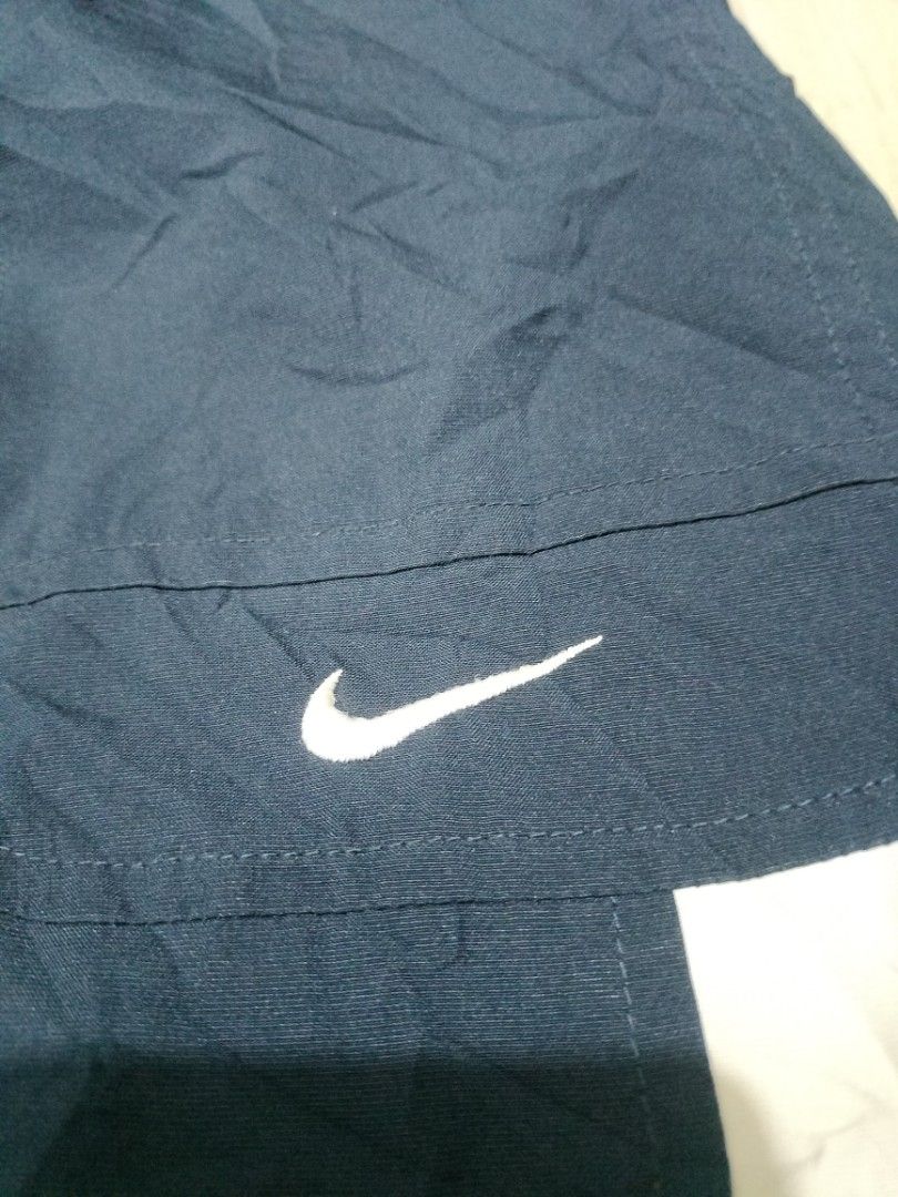 Y2k Nike track pants, Men's Fashion, Bottoms, Joggers on Carousell