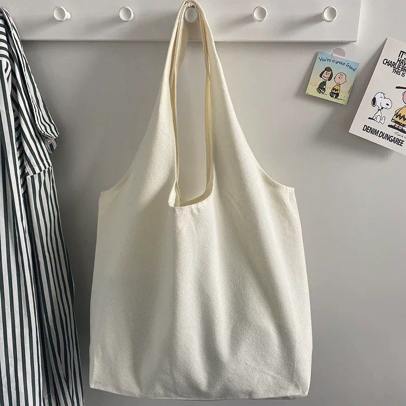 White canvas handbags on sale