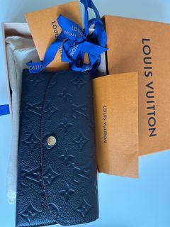 Luxury Market Consignment Boutique - Louis Vuitton Portefeuille Lock Mini  Wallet just in! Like new condition. See details on website.   lock-mini-wallet-f108d