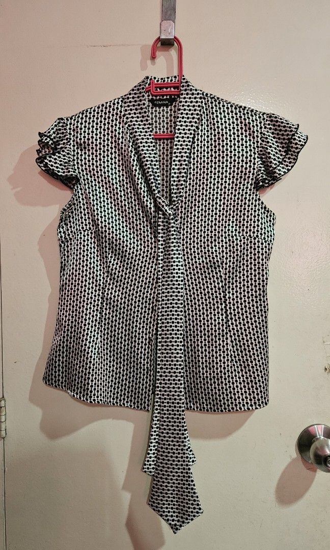 Femina Silk Polka dotted Blouse (Category: Blouses) located in Manila. Submitted by _sabm (Listing ID 1260117678, Image 1). Description: Femina silk blouse with polka dots with ruffled short sleeves.
