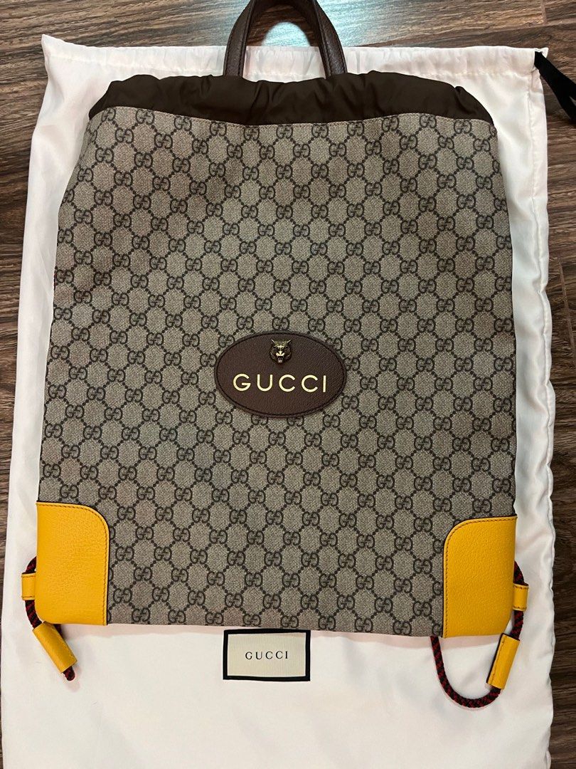 Gucci gg supreme drawstring backpack top