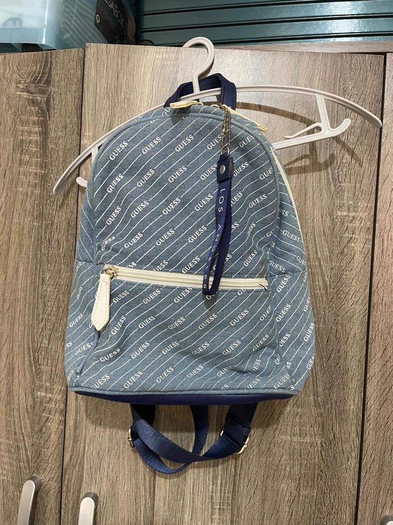 GUESS All Over Logo Backpack, Women's Fashion, Bags & Wallets