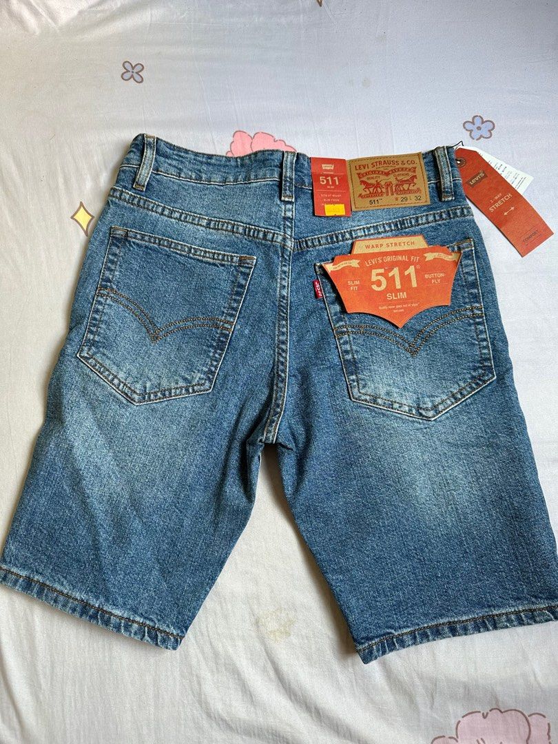 Levi ripped jean shorts mens online